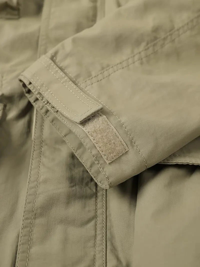 Giacca con cappuccio staccabile con maniche antivento adatta per attività all'aperto gilet multitasche impermeabile casual da uomo