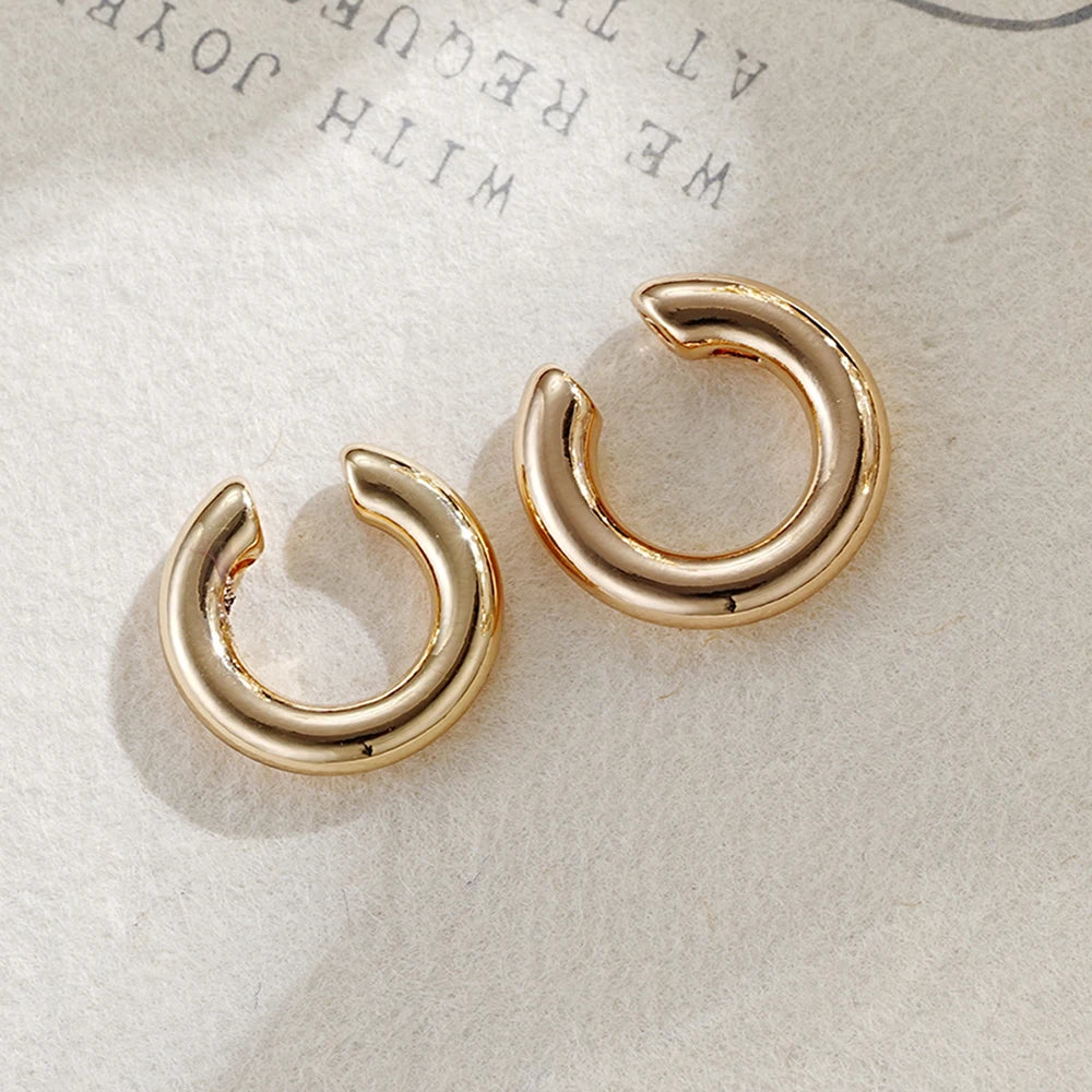 Nuovo alla moda unico falso metallo perforato Clip dell'orecchio asimmetrico circolare cartilagine donne gioielli di moda regalo polsino dell'orecchio ragazza